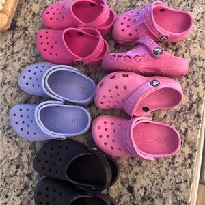 Lot of 5 pairs- CROCS Kids Water Shoes - Pink, Purple, and Black. Size 8